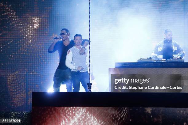 JoeyStarr and Kool Shen of NTM perform during the Etam Spring Summer 2018 show as part of Paris Fashion Week at on September 26, 2017 in Paris,...