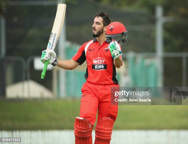 Cameron Valente of SA celebrates his century during the JLT One Day Cup match between South Australia and the Cricket Australia XI at Allan Border...