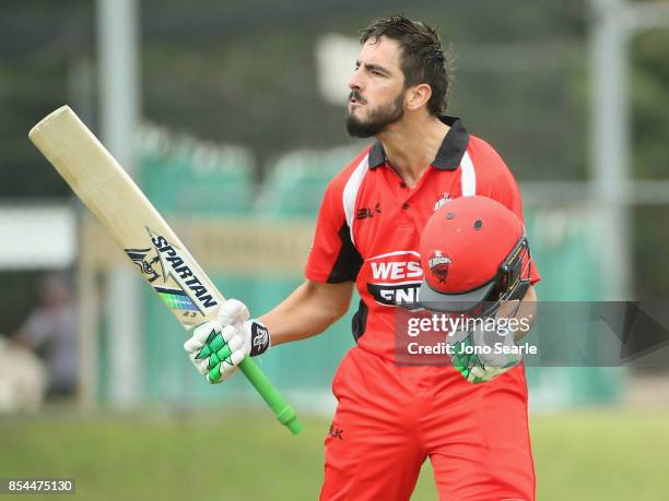 Cameron Valente of SA celebrates his century during the JLT One Day Cup match between South Australia and the Cricket Australia XI at Allan Border...