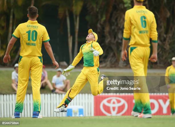 Wicket keeper Harry Nielsen of CA XI tries to catch a ball during the JLT One Day Cup match between South Australia and the Cricket Australia XI at...