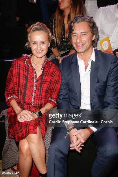 Laurent Solly and his wife Caroline Roux attends the Etam show as part of the Paris Fashion Week Womenswear Spring/Summer 2018 at on September 26,...