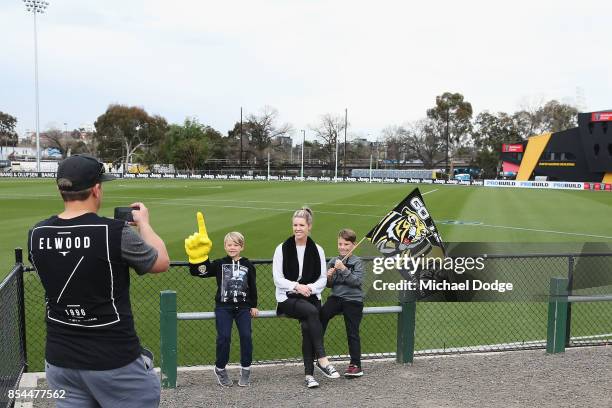 Tigers fans from Batemans Bay pose in front of the Punt Road Oval on September 27, 2017 in Melbourne, Australia. The Richmond Tigers will play the...