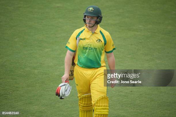 Max Bryant of the CA XI leaves the ground after getting out during the JLT One Day Cup match between South Australia and the Cricket Australia XI at...