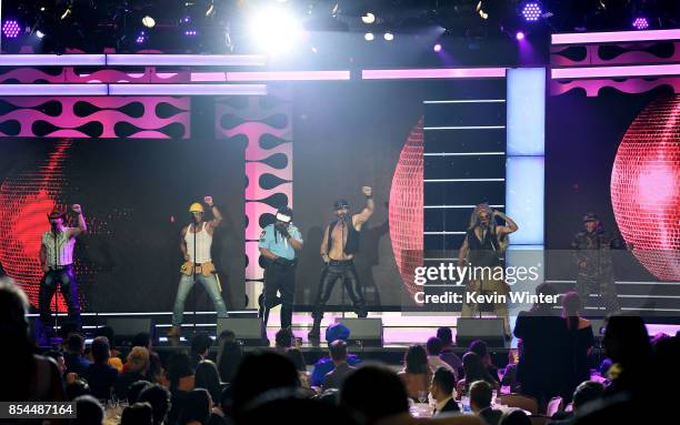 Drew Baldwin with Chad Freeman, James Kwong, J.J. Lippold, Victor Willis, Angel Morales and Sonny Earl of Village People at the 2017 Streamy Awards...