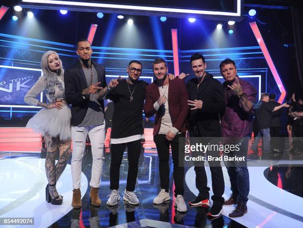 Past "Ink Master" winners Ryan Ashley, Anthony Michaels, Joey Hamilton and Steven Tefft pose for a photo with Season 9 Winners DJ Tambe and Bubba...