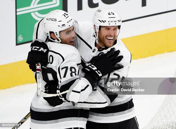 Alex Iafallo and Brooks Laich of the Los Angeles Kings celebrate the game-winning goal after Laich scored 12 seconds into overtime during a preseason...