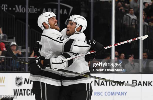 Alex Iafallo of the Los Angeles Kings hugs temmate Brooks Laich after he scored a game-winning goal in overtime against the Vegas Golden Knights...