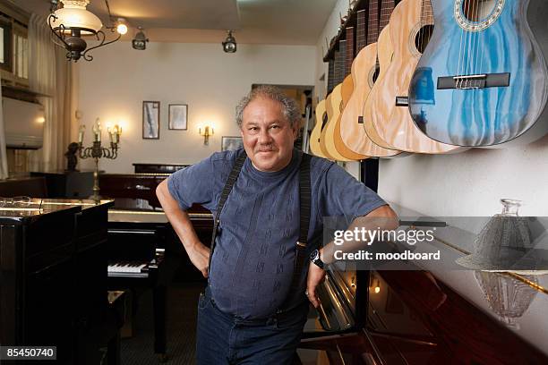 Singer Owner Man Music Store Photos and Premium High Res Pictures - Getty Images