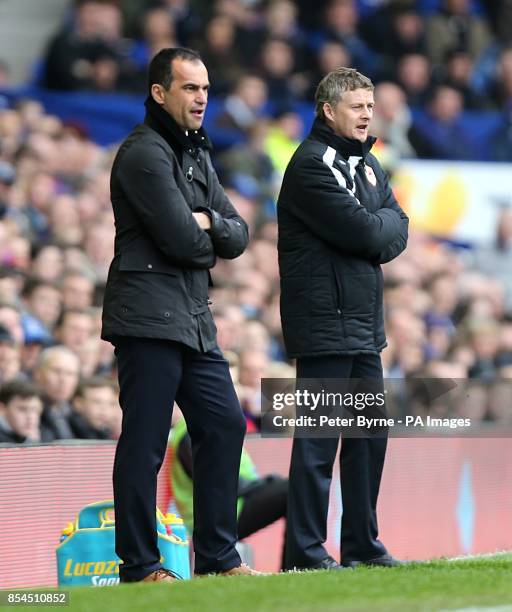 Everton manager Roberto Martinez and Cardiff City manager Ole Gunnar Solskjaer on the touchline