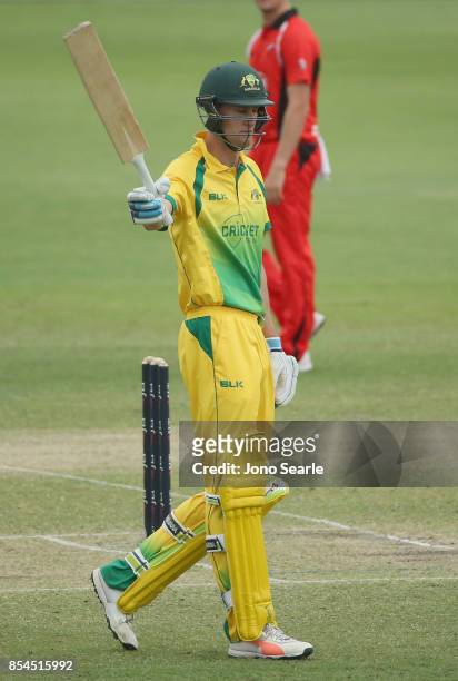 Beau Webster of the CA XI celebrates a 50 during the JLT One Day Cup match between South Australia and the Cricket Australia XI at Allan Border Field...