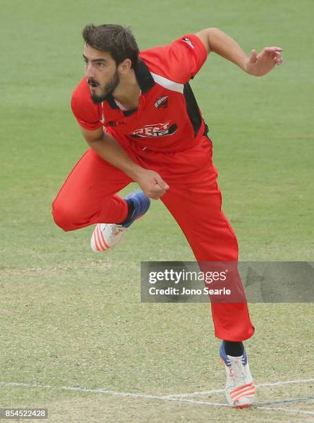 Cameron Valente of SA Bowls during the JLT One Day Cup match between South Australia and the Cricket Australia XI at Allan Border Field on September...