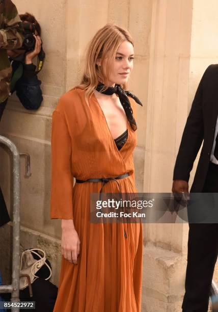 Model Camille Rowe attends the Christian Dior Show as part of the Paris Fashion Week Womenswear Spring/Summer 2018 on September 26, 2017 in Paris,...