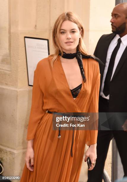 Model Camille Rowe attends the Christian Dior Show as part of the Paris Fashion Week Womenswear Spring/Summer 2018 on September 26, 2017 in Paris,...