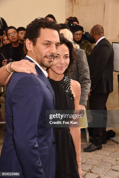 Tomer Sisley and his wife Sandra Zeitoun attends the Christian Dior show as part of the Paris Fashion Week Womenswear Spring/Summer 2018 on September...