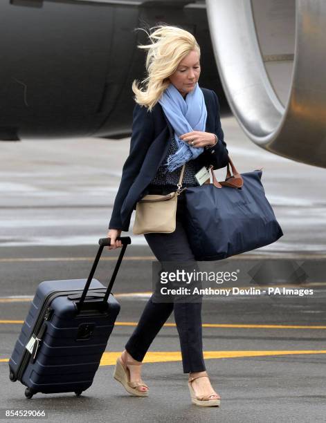 Amanda Cook Tucker, hairdresser for the Duchess of Cambridge, arrives at Wellington Military Terminal on the first day of their official to Australia.
