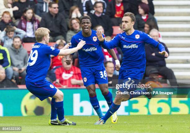 Cardiff City's Juan Cala celebrates his goal with Cardiff City's Mats Moller Daehli and Wilfried Zaha during the Barclays Premier League match at St...