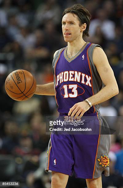Steve Nash of the Phoenix Suns dribbles the ball against the Golden State Warriors during an NBA game on March 15, 2009 at Oracle Arena in Oakland,...