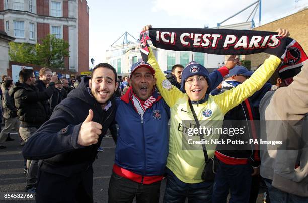 Paris Saint-Germain fans make their way to the ground