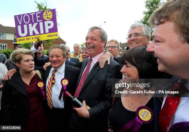 Ukip party leader Nigel Farage meets his new councilors during a visit to South Ockendon, Essex, as his party make gains across the country following...