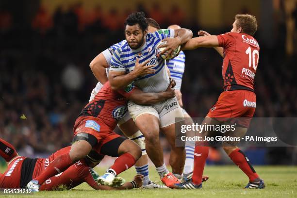 Saracens' Billy Vunipola bounces off RC Toulon's Jonny Wilkinson as he is tackled by Steffon Armitage during the Heineken Cup Final at the Millennium...