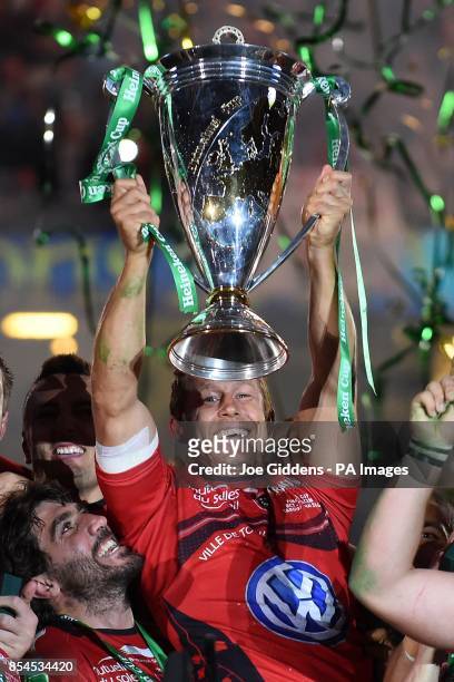 Toulon's Jonny Wilkinson lifts the trophy after winning the Heineken Cup Final at the Millennium Stadium, Cardiff.