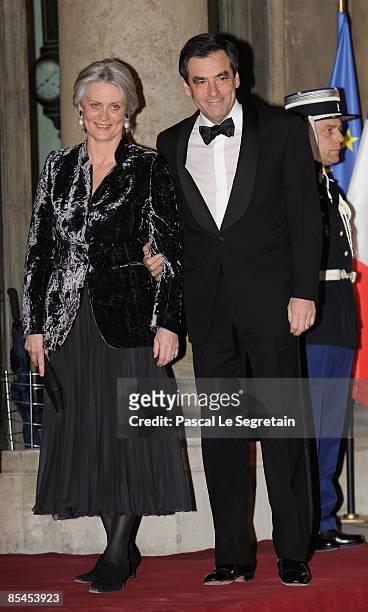 French Prime Minister Francois Fillon and wife Penelope Fillon attend State Dinner at Elysee Palace honouring Michel Sleimane on March 16, 2009 in...