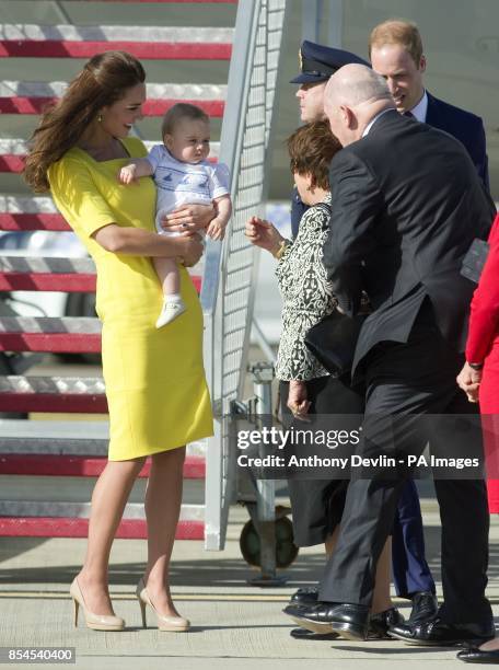 The Duke and Duchess of Cambridge and Prince George arrive at Sydney Kingsford Smith Airport on a Royal Australian Air Force aircraft during the...