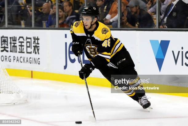 Boston Bruins left defenseman Matt Grzelcyk starts a rush up ice during a preseason game between the Boston Bruins and the Philadelphia Flyers on...