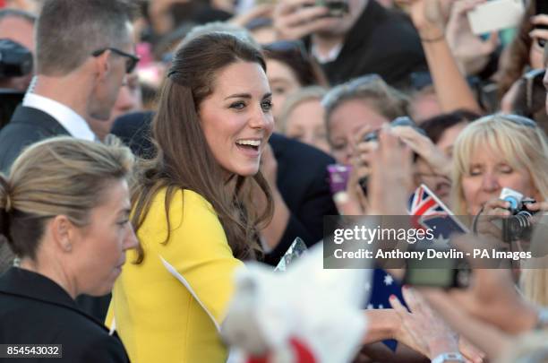 The Duke and Duchess of Cambridge meet the crowd as they leave the Sydney Opera House following a reception hosted by the Governor and Premier of New...