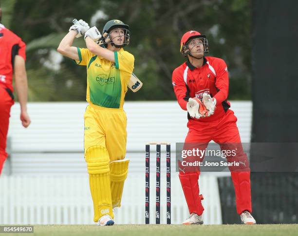 Jake Carder of CA XI hits a ball during the JLT One Day Cup match between South Australia and the Cricket Australia XI at Allan Border Field on...