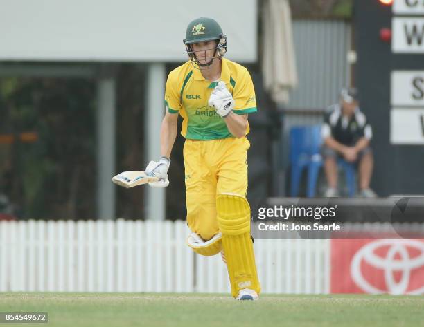 Jake Carder from CA XI celebrates his century during the JLT One Day Cup match between South Australia and the Cricket Australia XI at Allan Border...