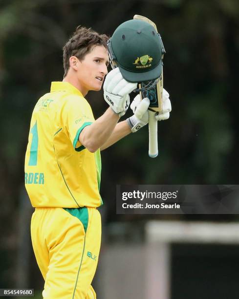 Jake Carder of CA XI celebrates his century during the JLT One Day Cup match between South Australia and the Cricket Australia XI at Allan Border...