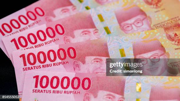 close up view of indonesian paper currency - indonesian rupiah note stock pictures, royalty-free photos & images