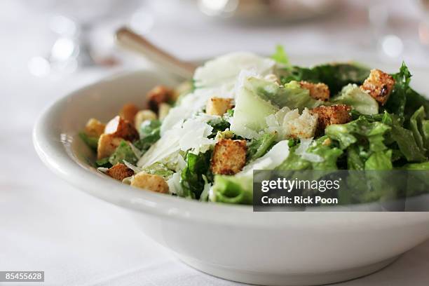 caesar salad with croutons and parmesan cheese - crouton stockfoto's en -beelden