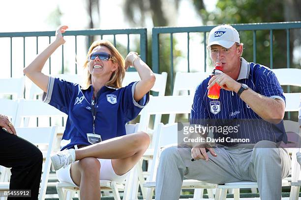 Ernie Els of South Africa and Lake Nona with his wife Liesl Els at the 18th hole during the first day of the 2009 Tavistock Cup at the Lake Nona Golf...