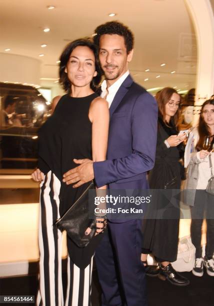 Tomer Sisley and his wife Sandra Zeitoun attend the E-Mehari X Courreges Cocktail Exhibition as part of the Paris Fashion Week Womenswear...