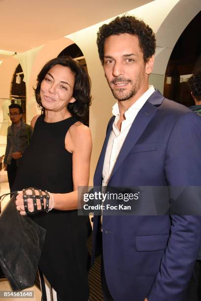 Tomer Sisley and his wife Sandra Zeitoun attend the E-Mehari X Courreges Cocktail Exhibition as part of the Paris Fashion Week Womenswear...