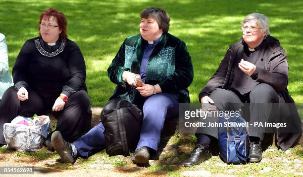 Trio of women Priests enjoy a sandwich and snacks, before joining other women clergy on a procession from Westminster to St Paul's Cathedral to mark...
