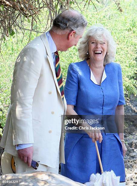 Prince Charles, Prince of Wales and Camilla, Duchess of Cornwall meet giant tortoises during a tour of the Darwin Research Station on Santa Cruz...