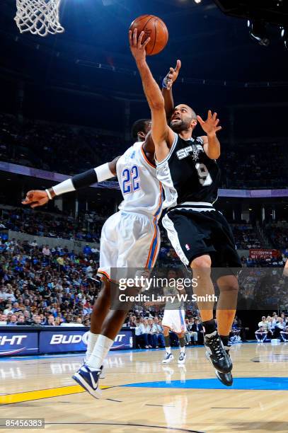 Tony Parker of the San Antonio Spurs goes to the basket against Jeff Green of the Oklahoma City Thunder at the Ford Center on March 16, 2009 in...