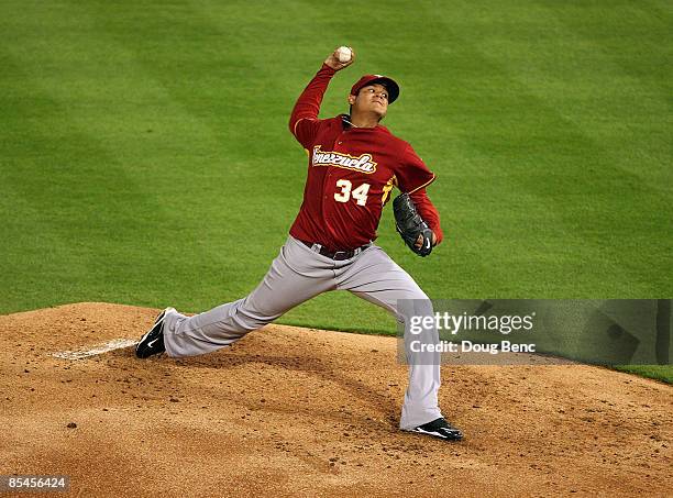 Starting pitcher Felix Hernandez of Venezuela pitches against Puerto Rico during day 3 of round 2 of the World Baseball Classic at Dolphin Stadium on...