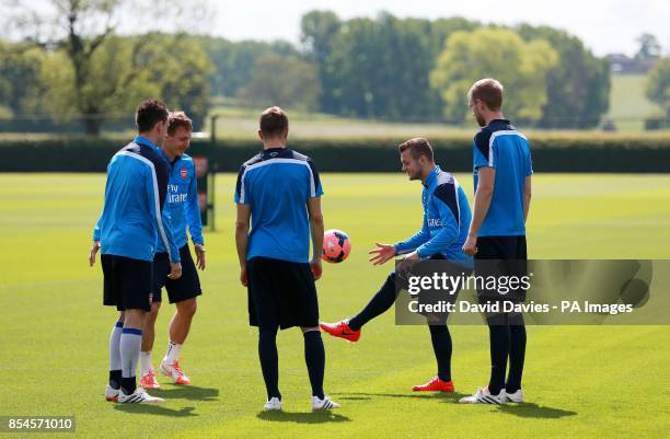 Arsenal's Jack Wilshere with team mates during the training session at London Colney, Hertfordshire.