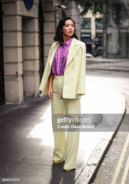 Betty Bachz seen wearing Nebo suit and a Lisou shirt on Day 3 of London Fashion Week September 2017 on September 17, 2017 in London, England.