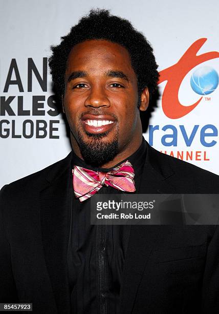 Football player and television personality Dhani Jones attends a cocktail reception and screening of "Dhani Tackles the Globe" at National Art Club...