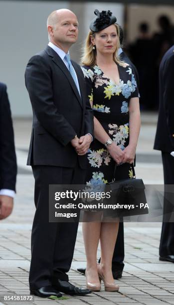 Foreign Secretary William Hague with his wife Ffion Hague look on as Queen Elizabeth II walks around the flower market to Marche aux Fleurs - Reine...