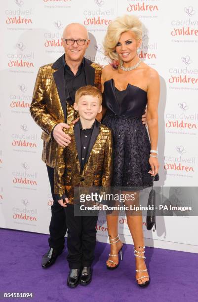 John Caudwell with partner Claire Johnson and son Jacobi arriving at the Caudwell Children Butterfly Ball, at the Grosvenor House hotel, in central...