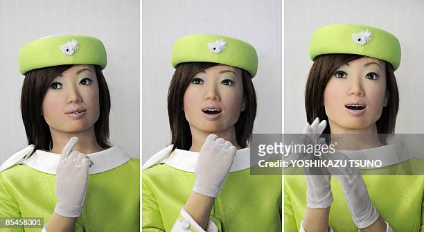 This combo picture shows a receptionist robot, produced by Japan's robot maker Kokoro during a demonstration at the company's factory in Tokyo on...