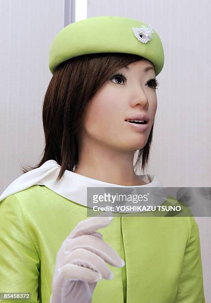 Receptionist robot, produced by Japan's robot maker Kokoro poses during a demonstration at the company's factory in Tokyo on March 2, 2009. The robot...