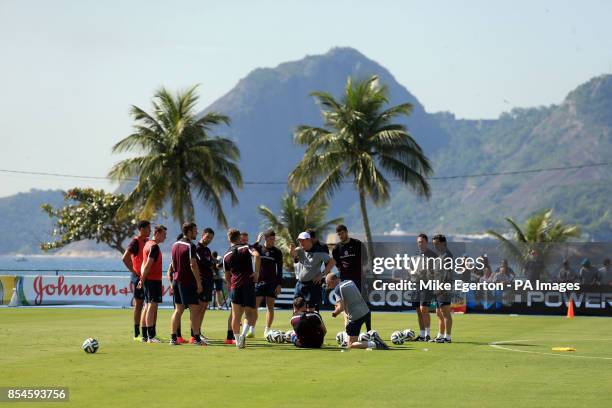 England manager Roy Hodgson talks to his squad during the training session at Urca Military Training Ground, Rio de Janeiro, Brazil.