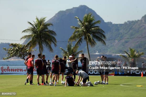 England manager Roy Hodgson talks to his squad during the training session at Urca Military Training Ground, Rio de Janeiro, Brazil.